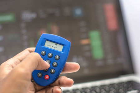 internet security token and atm card or credit card in front of screen monitor, internet security