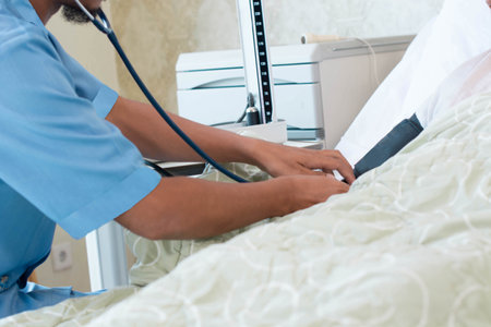 nurse and patient interaction at hospital clinic bed room
