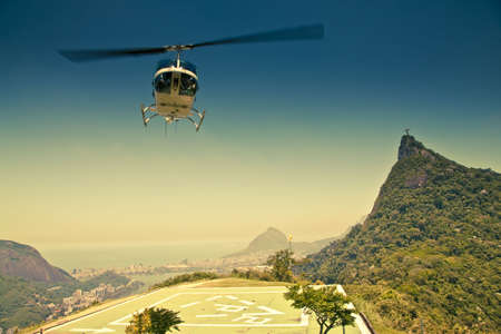 sightseeing helicopter in front of Corcovado and the statue of Christの写真素材