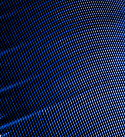 Dark blue Metal Mesh Texture closeup shotの写真素材