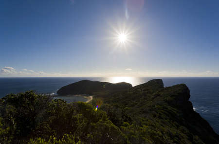 Sunset over mountains on Tropcial Islandの写真素材