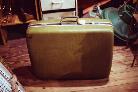 Antique mossy green leather suitcaseの写真素材