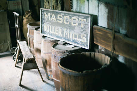 Vintage wodden barrels and sign