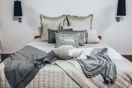 Styled bed in bedroom