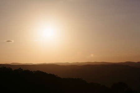 A beautiful sunset over the Sunshine Coast hinterland.  Located at Mapleton Falls, QLD, Australia.