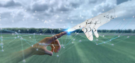 smart farming with futuristic agriculture technology concept, hand man point to robot hand together...