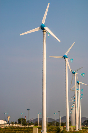 The Wind turbine on the over the blue skyの写真素材