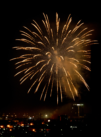 Brightly colorful fireworks and salute of various colors in the night skyの写真素材