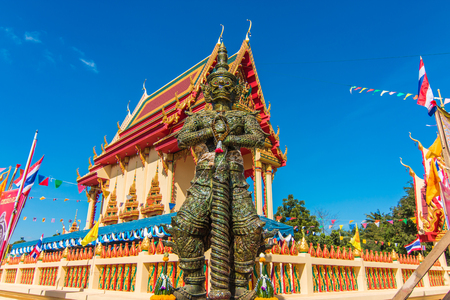 Giant statue at Temple of the Emerald Buddhaの写真素材