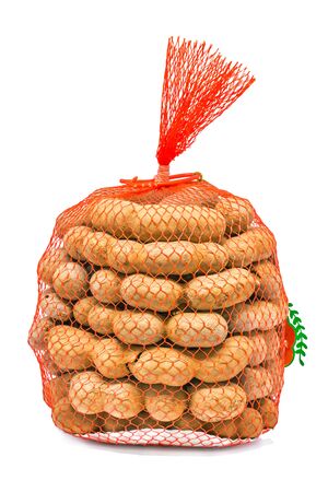 The tamarind in red net on white backgroundの写真素材