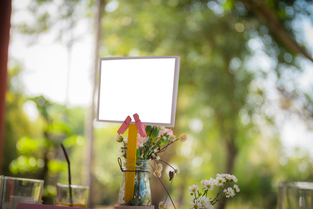 The  blank label on table with bokeh backgroundの写真素材