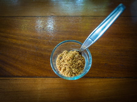 Top view glass of coconut palm sugar for coffeeの写真素材