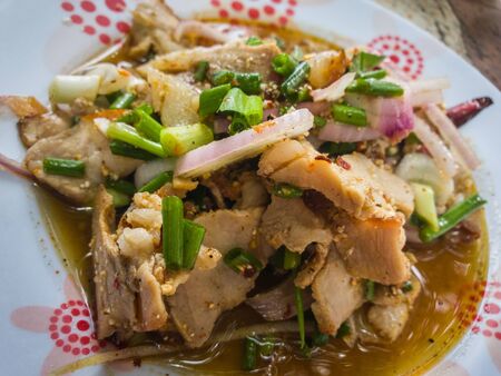Sliced grilled beef salad in plate. spicy Thai style