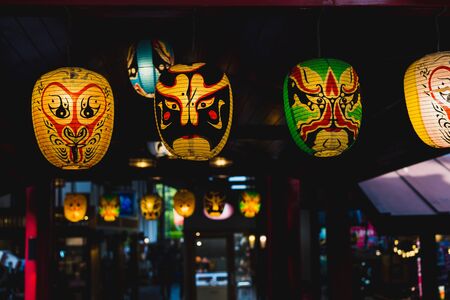 JAPANESE KABUKI NOH Mask lamp in dark backgroundの写真素材