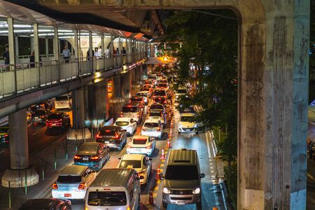 BANGKOK, THAILAND - JULY 25, 2018. Rush-hour on the Ratchadamri road, in the Bangkok district Pathum Wan. The area is home of shopping malls, hotels and high-rises and business centerのeditorial素材