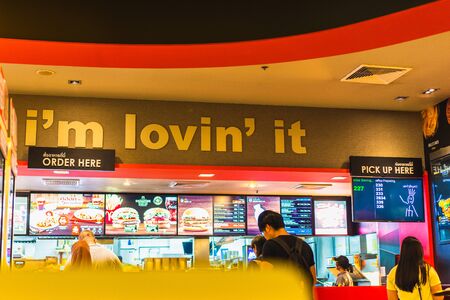 The BANGKOK, THAILAND - JULY 25, 2018: MCDONALDS RESTAURANT Sign board at Amarin Plaza is shopping mall located in the centre of Bangkok's Ratchaprasong district on JULY 25, 2018 in Bangkok, Thailandのeditorial素材