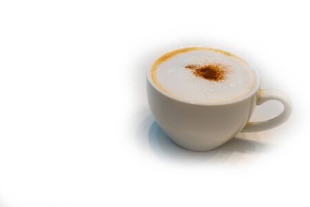 Cappuccino coffee set in white cup on white tableの写真素材