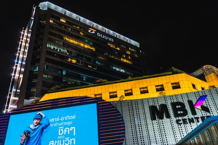 The BANGKOK, THAILAND - JULY 26,2018:Beauty Night scene of Thanachart Bank in side MBK big shopping mall on JULY 26, 2018 in Bangkok, Thailand.のeditorial素材