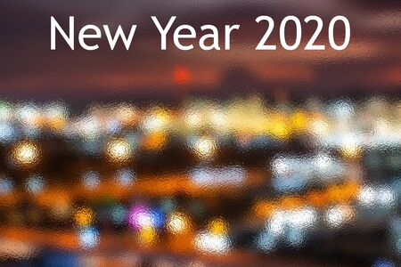 The Happy New Year 2020 With Dark Navy Blue Glitter Bokeh Light Sparkling Background,holiday Celebrationの写真素材