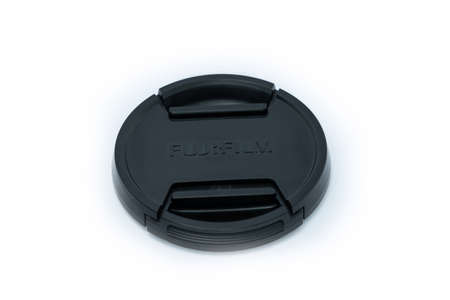 Chonburi, Thailand - MAY 20, 2020: Lens caps For Fujifilm lens on the withe background with space for put the text.のeditorial素材
