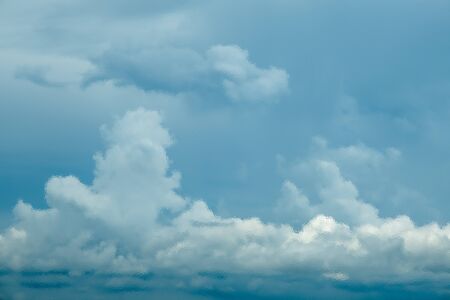 The Blue sky with white cloud frosted glass texture as background.の写真素材