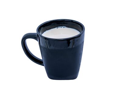 A black Glass of milk on white background. Healthy beverage concept.の写真素材