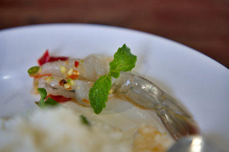 Close-up photo of shrimp soaked in fish sauce, spicy sauceの写真素材
