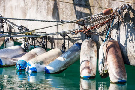 Mooring with fenders at the port