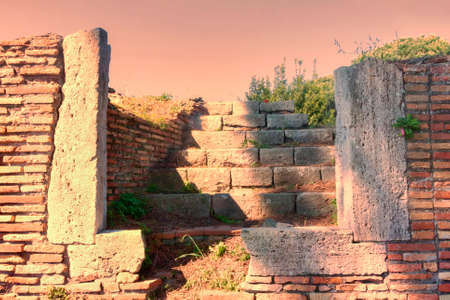 Gate with stairs in the Roman archaeological site of Ostia Antica - Romeの写真素材