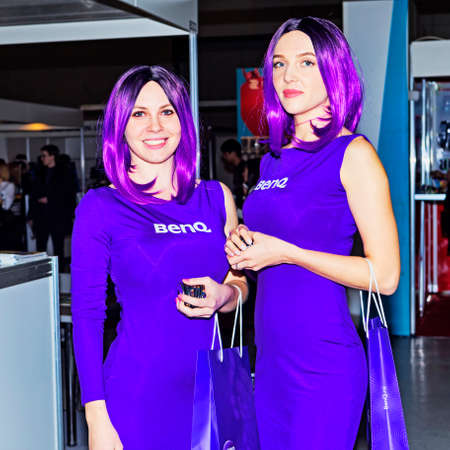Moscow, Russian Federation - April 22, 2017: BenQ image Girls at photoforum trade show and exhibitionのeditorial素材