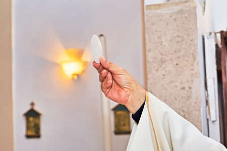 Catholic religious ceremony of Eucharist - selective focus