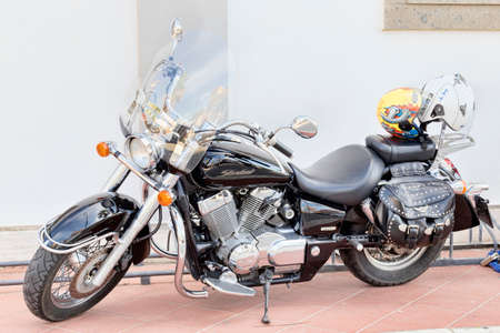 Rome, Italy - June 27, 2018: Beautifull custom motocycle Honda Shadow 750 parked on the seafront in...