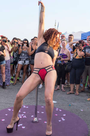 Ostia Lido Rome, Italy - July 14, 2018 :Lapdancer performs on the day of Lazio pride in Rome.Lazio pride  It s event for the rights, protection and pride of LGBTI people (Lesbian, Gay, Bisex, Trans and Intersex).のeditorial素材
