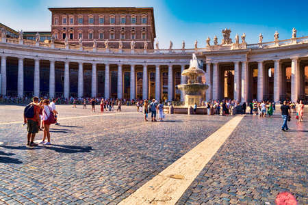 Vatican City,Vatican State - July 19, 2018:Tourists enjoy the beauties of St. Peter's Square. St. Peter's Square is located in front of St. Peter's Basilica in the Vatican City.のeditorial素材