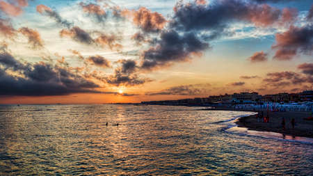 Beautiful colorful scenic sunset on the sea of Rome in Lido di Ostia - Italyの写真素材