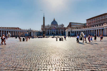 Vatican City,Vatican State - July 19, 2018:Tourists enjoy the beauties of St. Peter's Basilica and it's square. St. Peter's Square is located in front of St. Peter's Basilica in the Vatican City.のeditorial素材