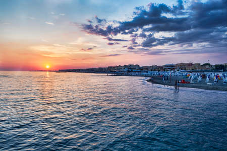 Scenic sunset in Rome with orange sunbeams hit the seaのeditorial素材
