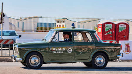 Rome,Italy - September 30, 2018: On the occasion of 50th anniversary of the foundation of the National Association of State Police, an outdoor exhibition of Alfa Romeo company vintage cars  with famous model Giulia Super of Female Police team.のeditorial素材