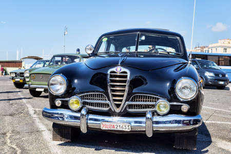 Rome,Italy - September 30, 2018: On the occasion of 50th anniversary of the foundation of the National Association of State Police, an outdoor exhibition of Alfa Romeo company vintage cars with famous model Alfa Romeo 1900 Super supplied to the Italian Poのeditorial素材