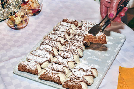 Let's party with many typical sicilian cannoli stuffed with ricotta cheese and candiedの写真素材