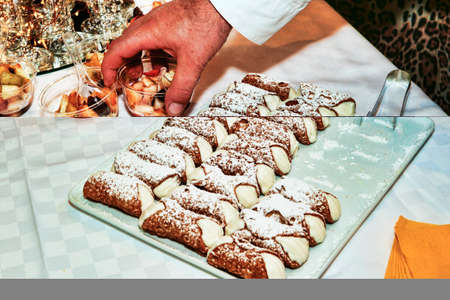 Let's party with many typical sicilian cannoli stuffed with ricotta cheese and candiedの写真素材