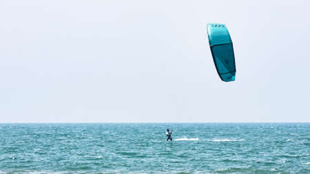 Lido dei Pini, Italy - April 25,2014: On the Roman sea of Lido dei Pini beach athlete performs...