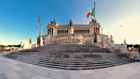 Panoramic view of Italian National Monument to Vittorio Emanuele II or Vittoriano with Altar of the Fatherland located at historic Piazza Venezia in ancient downtown Romeの写真素材