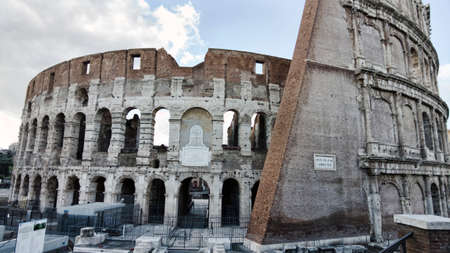 Impressive view of Colosseum in Rome, famous Roman architecture and biggest ancient amphitheater in the worldの写真素材