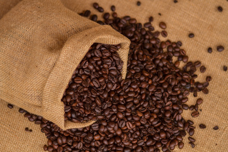 Coffee bag - coffee beans in canvas sack coffee isolated on canvas background