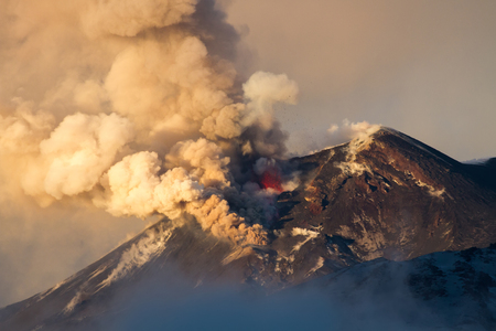 Volcano eruption. Mount Etna erupting from the crater Southeastの写真素材