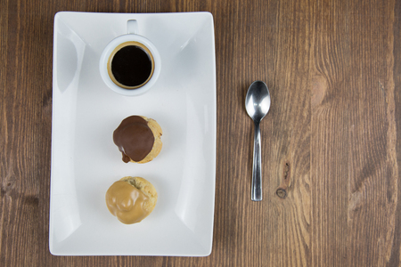 Isolated Sicilian pastry on white circular Flat on wooden table