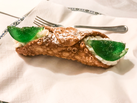 close up of Sicilian Cannolo isolated on white background, traditional italian dessert with ricottaの写真素材