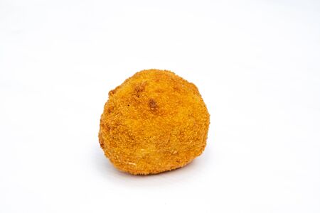 Sicilian Arancino or Arancina. A typical Sicilian street food. Made with rise, ham, meat and cheese.の写真素材