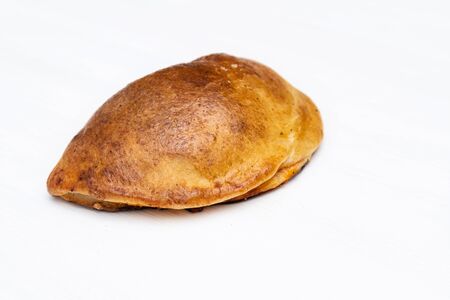 Sicilian Cartocciata. A typical Sicilian street food. Made with olives, tomato, ham, and cheese.